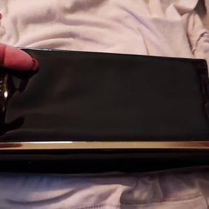 Black with gold trim purse 8"x5"